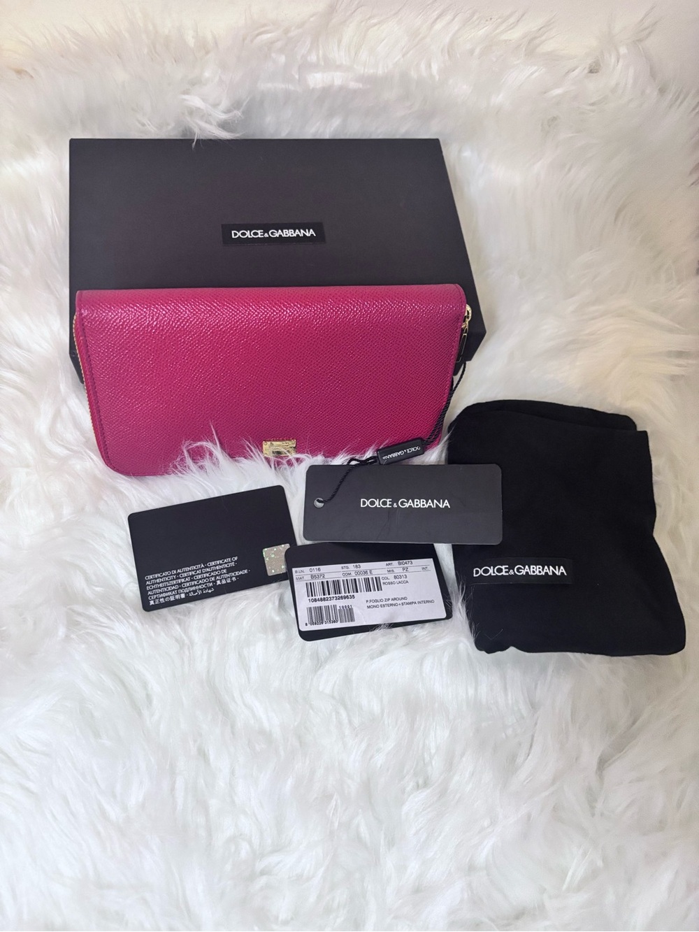 New with tag Dolce & Gabbana red Textured Leather Zip Wallet.